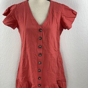 Red button drop waist dress.